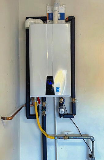 https://northfremantlehotwater.com.au/uploads/2025/06/instant-hot-water-systems-63860.jpg